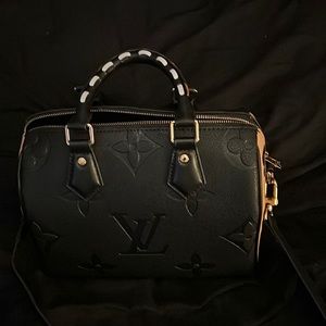 Louis Vuitton speedy 25 wild at hearts.